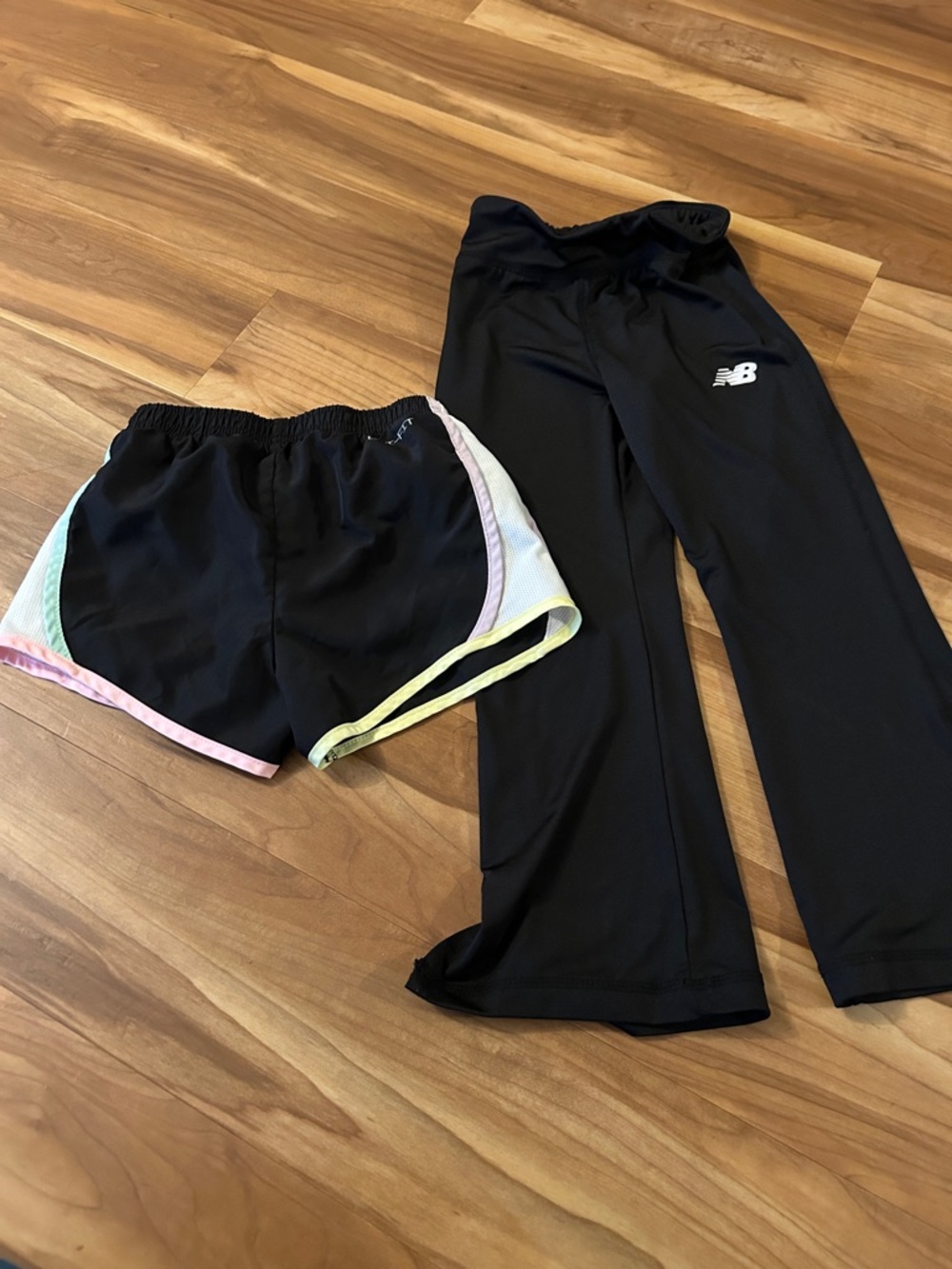 New Balance Black Track Pants and Black Running Shorts with Pastel Trim